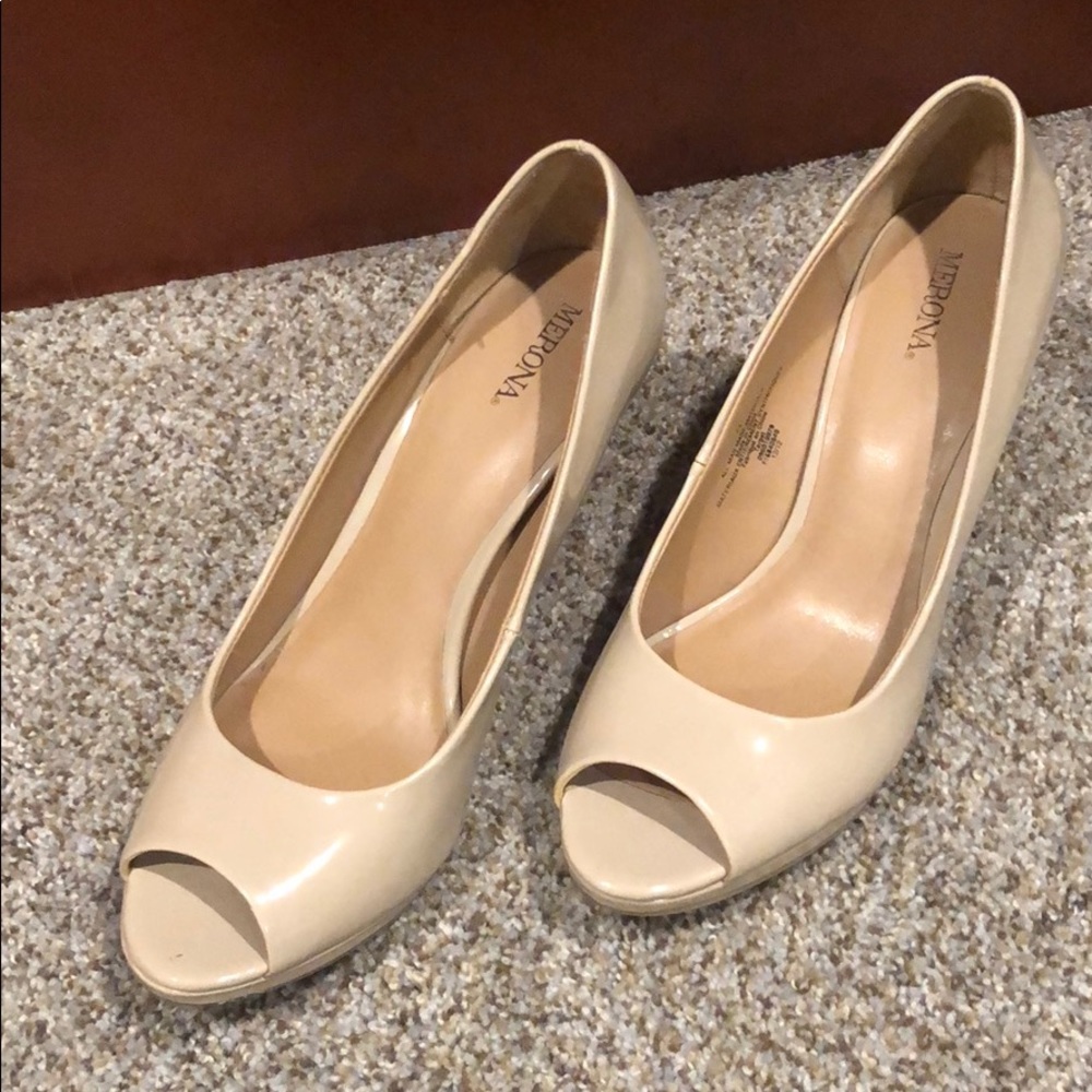 Nude open toe pumps